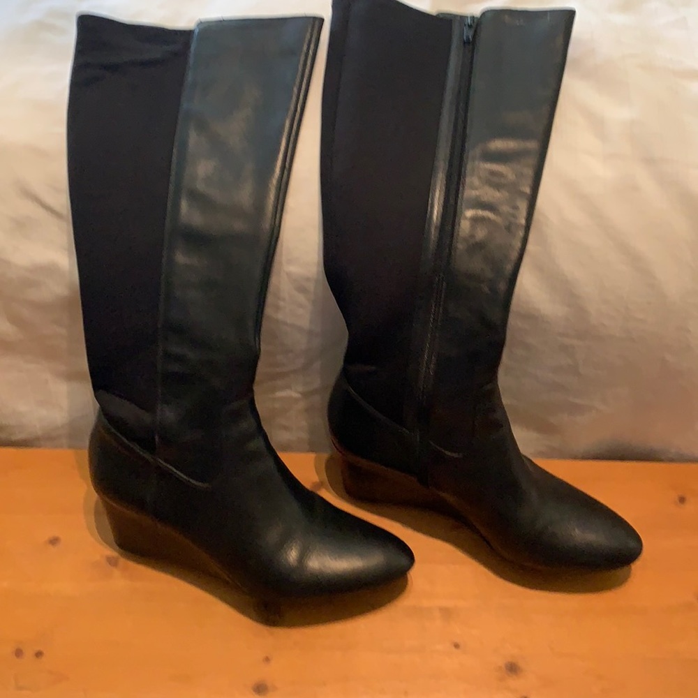 Knee high black leather boots